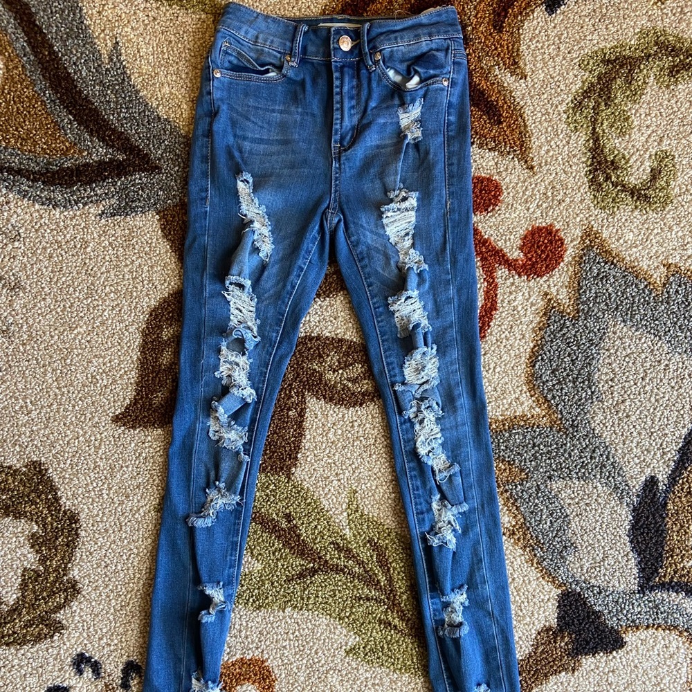 blue ripped high rise jeans